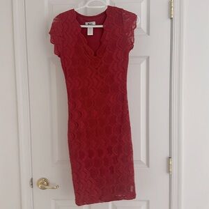 Crimson red lined lace dress. Fitting but with good stretch